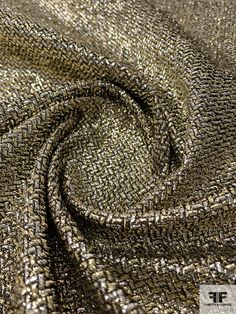 The closer you examine this elegant micro chevron lame European designer fashion fabric in gold, silver, and black, the more its beautiful detail reveals itself. SKU: 7839 Content: Poly / Lurex Color: Gold / Silver / Black Width: 54 inches Origin: Italy This fabric is a last cut and no longer in production. Once sold out, we are unable to get more. Lame Fabric, Fashion Portfolio, Black Design, Fashion Fabric, Black Fabric, Braided Rugs, Silver Gold, Fashion Design, Fabric