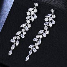 Diamond White Elegant Bridal Earrings For Party, Elegant Crystal Chandelier Earrings For Party, Party Crystal Chandelier Earrings With Elegant Design, Diamond White Dangle Bridal Earrings For Party, Diamond White Bridal Dangle Earrings For Evening, Diamond White Dangle Bridal Earrings For Evening, Elegant Silver Jewelry For Prom, Elegant Silver Earrings For Prom, Earrings For Bride