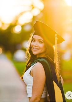 a woman wearing a graduation cap and gown