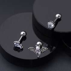 One package includes three pieces cartilage earring. Gauge: 16g(1.2mm) Bar Length: 6mm Ends Ball Diameter: 4mm Material: 316L Surgical Stainless Steel One package contains 3pcs cartilage earrings: ghost design, bat design, round zircon design. This cartilage earring is made of 316L Stainless Steel, Nickel Free, Healthy for Sensitive Skin. Dainty ghost and bat Design could show personal characteristics, also is an ideal gift for friend on Halloween day(as Halloween Jewelry), Christmas. You can ch Conch Earrings, Conch Stud, Ghost Bat, Bat Design, Tragus Earring, Cartilage Stud, Conch Earring, Ghost Design, Cartilage Earring