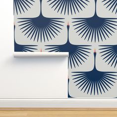 the wallpaper is designed to look like an abstract design with blue and white leaves