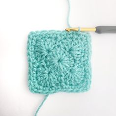 the crochet square is being worked on