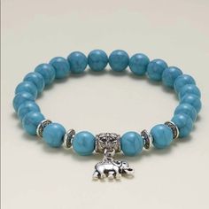 Turquoise Stone Is The One That Align And Balance The Chakra It’s Known To Dispel Negative Energy This Bracelet Has A Elephant Charm For Good Luck Its Made With Elastic Clear String To Stretch Perfect For A Gift To Someone Special Casual Turquoise Jewelry With Gemstone Beads, Bohemian Light Blue Bracelets For Jewelry Making, Elegant Turquoise Adjustable Charm Bracelet, Turquoise Beaded Charm Bracelet For Gift, Turquoise Beaded Charm Bracelet Gift, Bohemian Blue Bracelets With 8mm Beads, Casual Light Blue Round Bead Jewelry, Turquoise Beaded Charm Bracelet With Round Beads, Nickel Free Blue Bohemian Beaded Bracelets