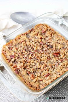 a casserole dish filled with oatmeal and pecans