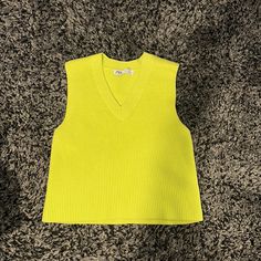 Zara Lime Green Cable Knit Sweater Size Small But Can Fit Medium Never Worn Excellent Condition Casual Yellow Sweater Vest For Fall, Casual Yellow V-neck Sweater, Yellow Knitted V-neck Top, Casual Yellow Sweater Vest For Winter, Knitted Solid Color Sweater Vest For Spring, Spring Knitted Sweater Vest, Yellow Sleeveless Top For Fall, Yellow Knitted Crew Neck Top, Trendy Yellow Knit Top