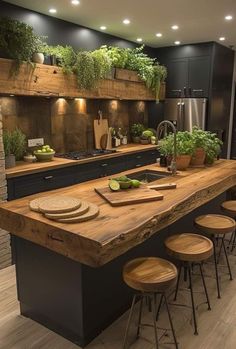 a large kitchen with wooden counter tops and stools next to an island in the middle