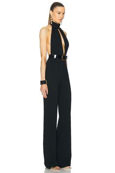 Find TOM FORD Stretch Sable Jumpsuit on Editorialist. TOM FORD Stretch Sable Jumpsuit in Black 97% viscose 3% elastane. Made in Italy. Dry clean only. Hidden back zipper closure. Attached waist belt with buckle closure. TFOF-WC3. TU0269-FAX1105. About the designer: Tom Ford lends a contemporary elegance to all things sartorial. Raised in Santa Fe, Ford made a name for himself as creative director at Gucci, where he transformed the house of fashion into a thriving 21st century brand before going on to launch his own wildly successful label in 2005. Today, Tom Ford is coveted for everything from its statement sunglasses and fine leather accessories to its glamorous dresses and impeccably tailored suits. A Tom Ford design is an exquisite balance of timelessness and modernity. Fitted Jumpsuits With Belt Loops For Night Out, Fitted Belted Strapless Jumpsuit, Sleeveless Belted Jumpsuits And Rompers For Evening, Chic Belted Strapless Jumpsuit For Party, Chic Strapless Backless Jumpsuit For Formal Occasions, Chic Strapless Backless Jumpsuit For Formal Events, Chic Halter Neck Strapless Jumpsuit For Evening, Chic Formal Strapless Backless Jumpsuit, Elegant Halter Neck Evening Jumpsuits And Rompers