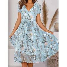 Season:Summer; Fabric:Polyester; Sleeve Length:Short Sleeve; Look After Me:Machine wash; Gender:Women's; Style:Streetwear,A Line; Elasticity:Micro-elastic; Occasion:Vacation,Street,Holiday; Fit Type:Regular Fit; Dresses Type:Casual Dress,Summer Dress,Swing Dress,A Line Dress; Pattern:Floral; Design:Print; Neckline:V Neck; Front page:FF; Listing Date:03/28/2024; Bust:; Length:; Shoulder Width:; Fit US Size:; Fit UK Size:; Fit EU Size:; Dress Length Type:Midi Dress; Print Type:Print Flower Pocket, Blue Lace Midi Dress, Print Chiffon Dress, Chiffon Floral, Floral Dresses Long, Dress Stores Online, Floral Print Midi Dress, V Neck Midi Dress, Dress Flower