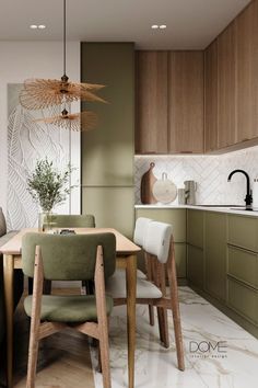 a dining room and kitchen area with green chairs