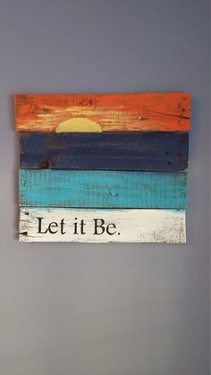 there is a sign that says let it be on the wall