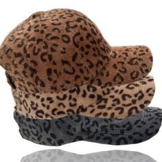 Dani & EmFuzzy Leopard Baseball Cap An adorable faux fur fuzzy leopard baseball cap.This super stylish cosy hat will keep you looking good and feeling warm. Comfortable and fashionable and perfect for casual wear, daily wear, outer wear, work wear, travel, and sport’s. Features a soft faux fur material which will keep your head warm and adds that special accent touch to any favorite top, sweater, jeans, winter coat, jacket, vest, scarf or more. An absolutely gorgeous addition to any wardrobe! One Size - Circumference: 56cm-60cm/22.0"-23.6"; Adjustable; Great fit for most teens and adults. Design : The leopard print baseball hat features an all over leopard print design Trendy Winter Flat Cap Baseball Cap, Trendy Brown Baseball Cap For Winter, Trendy Brown Winter Baseball Cap, Casual Faux Fur Beanie Hat, Casual Faux Fur Beanie, Trendy Winter Baseball Cap, Trendy Leopard Print Cap, Casual Adjustable Hat With Faux Fur Lining, Casual Hats With Adjustable Faux Fur Lining