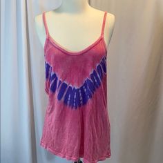 Brand New With Tags Tie Dye Tank Top In Pink & Purple ~ This Is A Loosefitting Tank In A Size Medium ~ I Have Been Selling This Chicago Based Brand For The Last 24 Years! Tagged Medium But Could Fit A Large 100% Rayon ~ Please Compare With Something On Your Closet For Best Fit- Bust - 38” Plus Stretch Waist - 42” Length - 28” Casual Purple Cotton Tank Top, Purple Cotton Tank Top For Spring, Spring Purple Cotton Tank Top, Purple V-neck Top For Summer, Purple Tank Top For Summer Loungewear, Summer Purple Tank Top For Loungewear, Trendy Purple Tank Top For Summer, Casual Mauve Tops For Summer, Casual Mauve Summer Tops