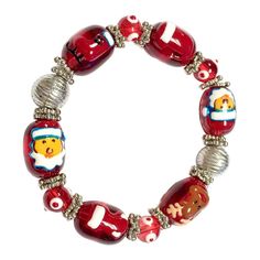 "Painting : Delicate Santa Claus, Red Hat, Ice Skating, Reindeer, Stocking on 18x14mm Red Oval Glass Beads. Style : Glass Beaded Stretchable Fits Medium Size Wrist. Size : Approx. 2.75\"x2.75\"x0.25\" (L x W x H). Color : Red. Material : Premium Glass Beads, Silver Plated Beads, Spacers and Triple Elastic Fiber Cords." Fits Medium Size, Reindeer Stocking, Gold Bracelets Stacked, Painted Santa, Autumn Bracelet, Beads Style, Gold Pumpkins, Halloween Bracelet, Word Bracelet