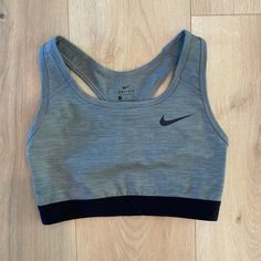 Size Small. Women’s Nike Training Sports Bra. Elastic Bottom For Support. Grey Type Coloring. No Padding. Nike Gray Athletic Fit Activewear, Nike Fitted Activewear With Built-in Padding, Nike Sporty Seamless Activewear, Nike Gray Activewear For Workout, Nike Gray Activewear For Sports Events, Nike Activewear For Light Exercise, Bra Friendly, Nike Seamless Activewear For Light Exercise, Nike Athletic Heather Activewear For Gym, Nike Athletic Heather Activewear For Running