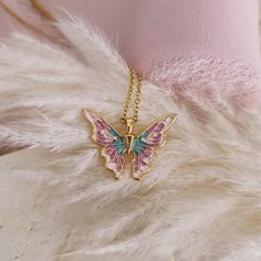 Material: Copper. Color: Gold. Chain Length: 14",16",18",20",22". Process: Gold Plated. Recipient: Women, Mom, Men, Wife, Girl Friend, Children. Product Type: Butterfly Necklace. Brand: Silviax Jewelry. Item:  2024NE0513           table { border-collapse: collapse; }         br { mso-data-placement: same-cell; }         tr { height: 21px; }         td { overflow: hidden; padding:2px 3px 2px 3px; width: 100px; white-space: nowrap; }         .s-124 { color: #000000;font-family: default;border-left:0.5pt solid #000000;border-top:0.5pt solid #000000;border-right:0.5pt solid #000000;border-bottom:0.5pt solid #000000;text-align: left; } Butterfly Charm Metal Necklace For Party, Butterfly Chain Necklaces, Butterfly Shaped Necklace With Chain As Gift, Butterfly Chain Necklaces For Party, Butterfly Chain Necklace For Party, Butterfly Shaped Metal Necklaces For Parties, Pink Metal Jewelry With Butterfly Charm, Pink Charm Necklace For Gift, Pink Pendant Chain Necklace Gift