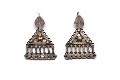 A pair of very rare, antique silver earrings from Oman, early 20th century.  The earrings have patina and wear according to their age.  Overall in good antique condition.  Length app. 3 inch.  Total weight 28.8 gram. Antique Ceremonial Earrings For Pierced Ears, Victorian Silver Ceremonial Earrings, Victorian Silver Earrings For Ceremonial Occasions, Antique Silver Plug Earrings, Vintage Sterling Silver Earrings For Ceremonial Occasions, Simple Silver Earrings, Antique Silver Earrings, Dull Colors, Dangle Necklaces