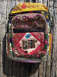 Fabulous, richly coloured fabric rucksack, boho styling with vibrant colours, reds, pinks, gold and turquoise. Gorgeous embroidered patterns. Adjustable straps, inner and outer pockets with zip fastening. Ethically sourced. Bohemian Backpack For Festivals, Bohemian Multicolor Backpack For Festival, Bohemian Rectangular Backpack For Festivals, Multicolor Rectangular Backpack For Festivals, Bohemian Multicolor Travel Backpack, Festival Rectangular Multicolor Backpack, Multicolor Rectangular Festival Backpack, Traditional Multicolor Backpack For Travel, Bohemian Backpack Shoulder Bag For Festivals