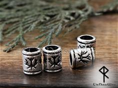 Celtic Beard Beads Maple Leaf Hair Rings, Viking Beard Beads Celtic Beard Rings, Hair Dreadlocks, Asatru Celtic Jewelry Viking Jewelry Norse The beads are made from antique Tibetan silver (Lead Free & Nickel Free) through casting technology and hand polished by me. Measurements: about 8.5 mm long, 7 mm wide, inner diameter: about 4 mm They are perfect for your Viking's beard or hair braids.  Please note, that each product is truly slightly unique to another. The colors might slightly differ from the photo due to different display settings. Please take a minute to look at the other items in my shop. Follow me on FACEBOOK to get an information about Norse mythology, EXCLUSIVE PROMOTIONS and DISCOUNTS  https://www.facebook.com/thenorsewindrunes/ Beard Rings, Beard Jewelry, Hair Dreadlocks, Beard Beads, Viking Beard, Cardboard Jewelry Boxes, Hair Braids, Small Shops, Hair Rings