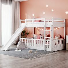 a child's bedroom with pink walls and white bunk beds, a slide in the middle