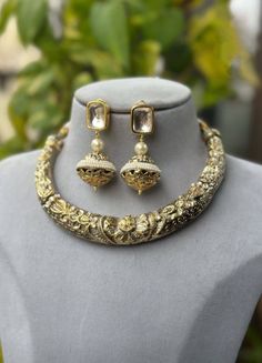 Beautiful Sabyasachi Inspired designer Antique Two Tone Hasli Necklace with matching kundan earrings. The Hasli has Adjustable  Dori  The Earrings Have pushbacks Handmade Highest quality and craftsmanship Customized orders takes 3 to 4 weeks, depending on piece requirements. The Ombre Designs Jewelry pieces can be customized in accordance with your requirement. Please Email or Whats app on : +91 8448833193 / sonalikamehra [!at] theombredesigns.com Sabyasachi Inspired Jewelry, Hansli Necklace Gold, Gold Hasli Designs, Hasli Designs, Hasli Necklace Gold, Sabyasachi Earrings, Hasli Necklace, Vintage Indian Jewelry, Punjabi Jewelry