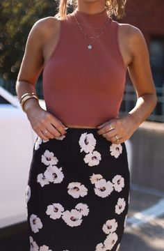 Look effortlessly chic in our Secret Rumor Floral Skirt! This stunning maxi skirt features a chic floral print and is made with lightweight fabric for a comfortable and flattering fit. Dress it down with a tank top or pair it with a cozy sweater for colder weather. Make a statement and feel your best! Fabric 100% polyester Chic Floral Print Maxi Skirt For Brunch, Floral Print Maxi Skirt For Brunch, Chic Floral Print Maxi Skirt For Day Out, Chic Stretch Maxi Skirt For Day Out, Feminine Floral Print Maxi Skirt For Day Out, Fitted Floral Print Maxi Skirt For Fall, Spring Feminine Stretch Maxi Skirt, Chic Maxi Skirt For Spring Brunch, Chic Spring Maxi Skirt For Brunch