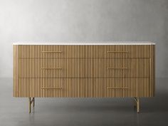 the sideboard is made out of wood and has two drawers, one with gold handles