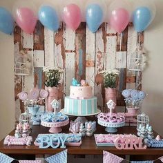 a table topped with cake and balloons next to a wooden sign that says instagram