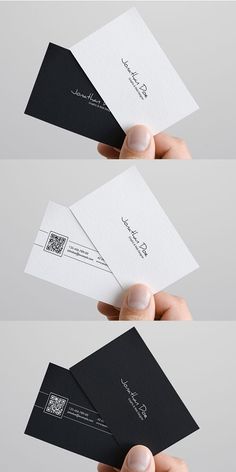 three different types of business cards with hand holding them