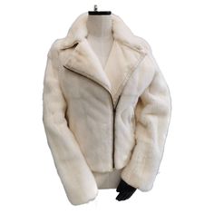 Fendi Cream Mink Fur Coat (Size 12 - L) When it comes to fur, Fendi is the ultimate reference in quality and style. This stunning Fendi coat is a classic with the perfecto design and leather stitching workmanship. It has a classic notch collar with a cream leather Fendi zipper closure. The sleeves are long and straight. This coat like new it has never been worn in its original condition. It is fully lined with a high quality Italian silk. Made in Italy PRODUCT DESCRIPTION: Closure: zipper Materi Fendi Fur Coat, Fendi Fur, Fendi Coat, Oversized Puffer Jacket, Chinchilla Fur, Oversized Puffer, Leather Stitching, Vintage Fendi, Vintage Coats