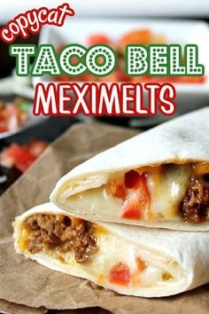 two burritos sitting on top of a piece of wax paper with the words copycat taco bell mexmelts