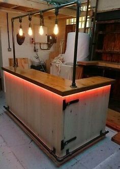 an industrial style bar with lights on it