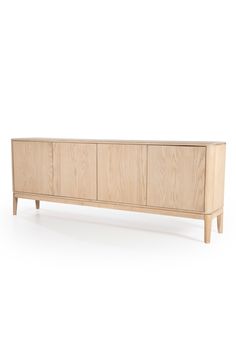 the sideboard is made out of wood and has three doors, two drawers and one door