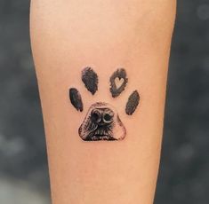 a dog's paw print with hearts on the inside of its nose and paws