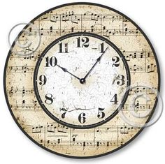 a clock with music notes on it and numbers painted on the front, back and sides