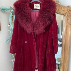 Vintage Faux Fur Beautiful Coat. It's So Cool! Fits Up To Around A Size 8/10 70s Coat Red Penny Lane Coat, Retro Long Sleeve Winter Fur Coat, Retro Long Sleeve Fur Coat For Winter, Red Single-breasted Outerwear For Winter, Burgundy Single-breasted Winter Outerwear, Burgundy Long Sleeve Outerwear For Party, Winter Party Burgundy Blazer, Red Christmas Party Outerwear, Red Long Sleeve Fur Coat For Winter