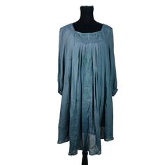 This Beautiful Blue Dress From Crescent Is Perfect For Any Casual Occasion. With A Trapeze And Swing Style And Knee-Length Dress Length, It's Both Comfortable And Stylish. The Dress Features 3/4 Sleeves And An Open Back, Making It Perfect For Any Season, Whether It's Winter, Summer, Fall, Or Spring. Additionally, The Dress Is Lined And Embroidered, Adding An Extra Touch Of Elegance. It's Available In Size Small And Would Make A Great Addition To Any Wardrobe. Personalization Is Not Available For Fitted Blue Tunic For Summer, Blue Fitted Tunic For Summer, Blue Half Sleeve Dresses For Daywear, Blue 3/4 Length Spring Dresses, Blue Spring Dress 3/4 Length, Blue 3/4 Length Summer Dress, Blue Flowy Dress With 3/4 Sleeve, Spring Blue 3/4 Length Dresses, Blue Long Sleeve Peasant Dress