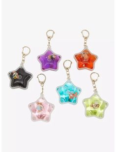 four different colored star shaped key chains