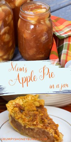 there is a piece of pie on the plate next to jars of apple pie in a jar