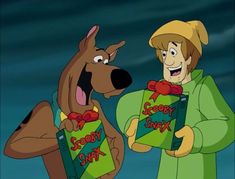 the scooby show has two dogs holding boxes with their mouths open and looking at each other