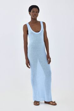 Deep scooped crochet maxi dress. Material that hugs the body, ultra flattering. Round neck cleavage. Sleeveless. Ribbed finish. Full length. The simplest and chicest way to elevate your summer look. Simply throw on the crochet maxi dress over your favorite swim set, add a pair of slides and sunnies and you are beach re Sleeveless Maxi Dress For Beach Season Loungewear, Sleeveless Maxi Dress For Beach Loungewear, Seamless Summer Maxi Dress, Seamless Maxi Dress For Summer, Chic Seamless Maxi Dress For Spring, Seamless Stretch Maxi Dress For Summer, Summer Scoop Neck Maxi Dress, Summer Scoop Neck Stretch Maxi Dress, Scoop Neck Summer Maxi Dress