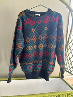 Awesome Abstract/ Geometric Grandpa sweater by Michael Gerald.  Size -- Doesn't say but fits like a Men's (gender neutral) Medium/Large Condition -- Good condition, it does show wear/pilling due to age. Please see photos for reference and please note may vary due to lighting.  Shipping -- Items packed with care in used boxes and other recycled materials because it makes the environment happy.  Returns -- With this being a vintage store, all items are sold AS IS. Check out my shop for more vintag Casual Argyle Pattern Crew Neck Sweater, Vintage Multicolor Winter Sweatshirt, Vintage Patterned Winter Sweater, Vintage Argyle Sweater For Fall, Winter Patterned Cotton Sweater, Retro Patterned Crew Neck Sweater, Retro Crew Neck Sweater With Argyle Pattern, Vintage Patterned Crew Neck Sweater, Retro Crew Neck Argyle Sweater