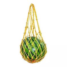 a watermelon in a net hanging on a white background