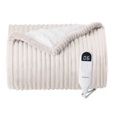 an electric heated blanket is shown with thermometer on it's back end