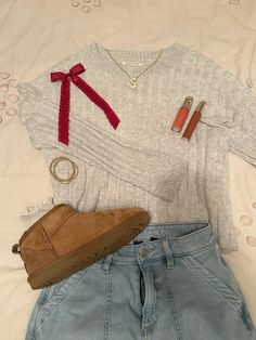 sweater- american eagle, jeans- american eagle, shoes- ugg, socks- free people, bow- urban outfiters American Eagle Sweater Outfit, Sweater And Uggs Outfit, American Sweater Outfit, Socks With Uggs, Christmas Eve Fits, Jeans With Uggs Outfit, American Eagle Jeans Outfit, American Eagle Outfits, Simple Outfits For School