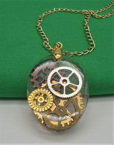 a necklace that has some gears inside of it