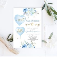 a blue and white heart shaped balloon is on the front of this watercolor wedding card