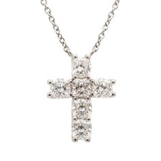 Gender: Ladies    Metal Type: 950 platinum    Length: 16.00 inches    Cross pendant measurements: 18.15mm x 14.15mm    Weight: 6.22 grams    Lady's custom made polished 950 platinum, diamond necklace. Engraved with "PT950".    Pre-owned in excellent condition.. Might show minor signs of wear.    Shared-Prong Set in 950 Platinum with:    Six (6) cushion brilliant cut natural diamonds:    Measurements: 4.45mm x 4.10mm x 2.80mm in depth.  Weight Range: 0.403 ct. - 0.438 ct.  Estimated Total Weight: 2.520 ct.  Color: G - H  Clarity: VS1 - VS2  Polish: Very Good  Symmetry: Very Good    TOTAL WEIGHTS:    Total weight of diamond(s): ~2.52 ctw.  Please reference the dimensions noted in the description above for the most accurate measuremens. White Gold Platinum Diamond Cut Necklace, White Gold Platinum Necklace With Diamond Cut, White Gold Necklaces With Platinum Diamond Cut, 14k White Gold Prong Set Necklace, Platinum Necklace With Brilliant Cut In Silver, Fine Jewelry Platinum White Gold Necklace, Silver Platinum Necklace With Brilliant Cut, White Gold Necklaces With Brilliant Cut In Platinum, White Gold Platinum Necklace With Brilliant Cut