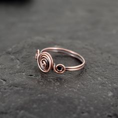 These rings are made with copper wire.  ✩ The item comes in a branded gift box- perfect for gifting.  ✩ All items are handcrafted by myself and every effort is taken to produce a high quality product.  ✩ If you have particular questions, send me a message! I am also doing jewelry upon request, so if you have an idea of what you want me to make for you, please get in touch to talk about it! Minimalist Copper Jewelry As A Gift, Minimalist Copper Jewelry As Gift, Minimalist Copper Jewelry Gift, Hand Wrapped Rose Gold Ring Gift, Rose Gold Hand Wrapped Ring As Gift, Minimalist Hand Forged Stackable Rings For Gift, Minimalist Hand Forged Stackable Rings As Gift, Handmade Elegant Copper Rings, Minimalist Hand Wrapped Ring For Gift