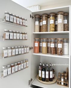 an organized pantry filled with lots of spices