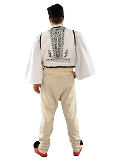 This outfit is imported from Greece and made by the premiere manufacturer of traditional Greek costumes. This traditional dancing costume is a favorite amongst dancing troupes and churches. This outfit ships direct from Greece. Please allow 1-2 weeks for arrival of outfit. This man's costume consists of felt vest with embroidery, shirt, waistband, hat (kalpaki) and wool trousers (bourazana).(Note:The tsarouchia and jewelry are sold separately.) SIZES TABLE - ADULT MALES Male Size Height Inches W Traditional Fitted White Vest, Fitted Traditional White Vest, Felt Vest, Greek Costume, Embroidery Shirt, White Vest, Wool Trousers, Vest White, Mens Costumes